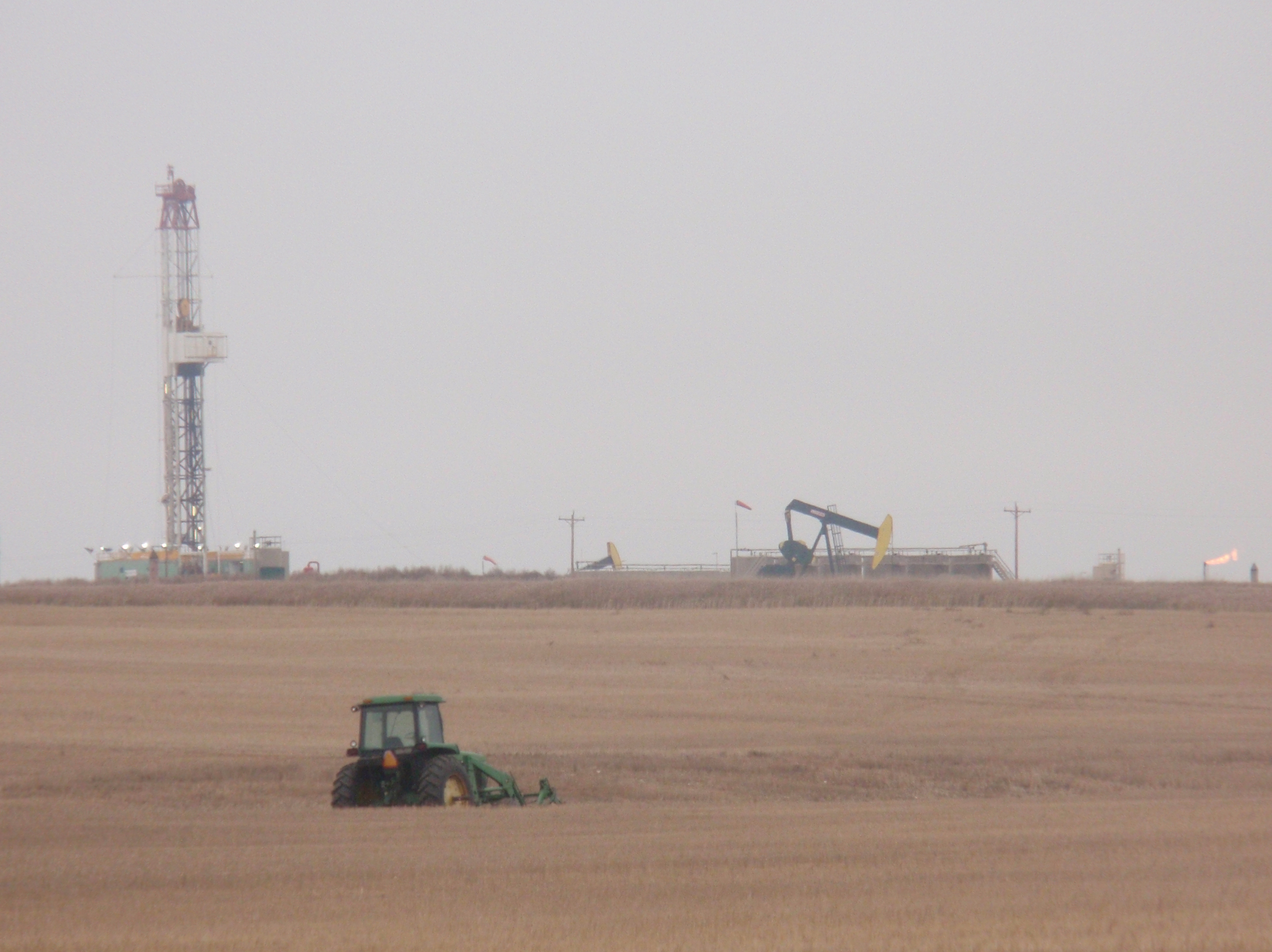 An increasingly rare sight in North Dakota. Not only the active rig, but the flaring as well. Photo by James Ulvog.